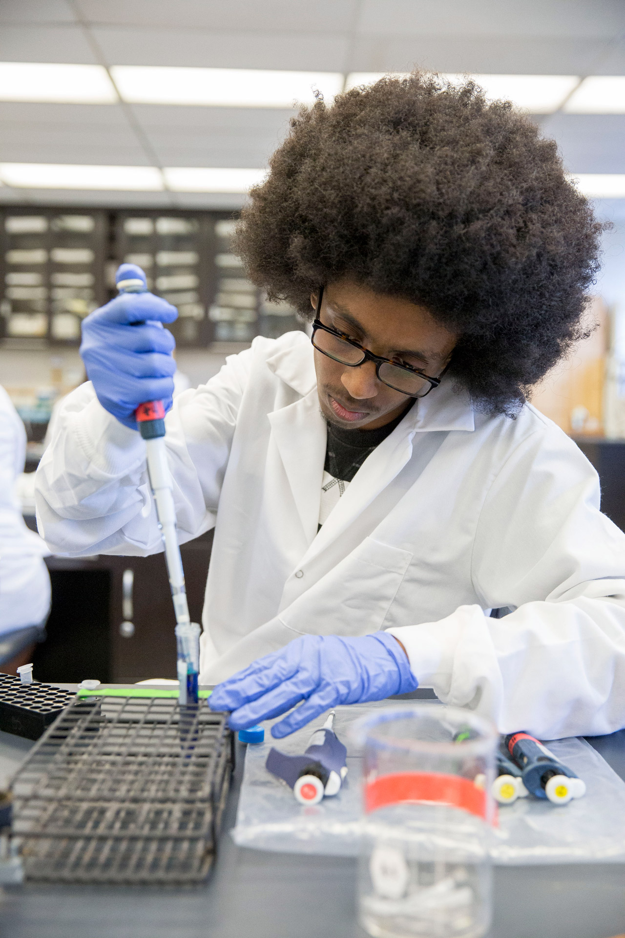 student with pipette